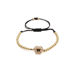 Verstellbares goldenes Perlenarmband mit schwarzem Schmetterling und Zirkonia