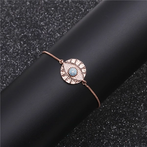Rose gold adjustable evil eye bracelet with blue zircon and snake chain design
