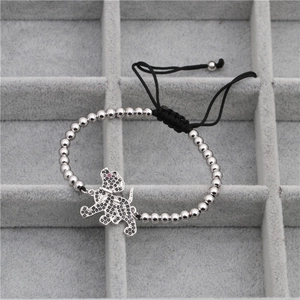 Macro shot of a panther charm bead bracelet with pave-set black and white zirconias