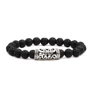 Bracelet perlé avec pierre de lave noire et breloque en métal argenté antique filigrané