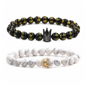 Detail of 8mm couple bracelets with black mantra beads and white turquoise stones