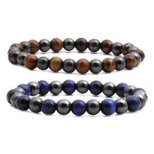 Set of two beaded hematite and tiger eye stone bracelets with a natural polished finish