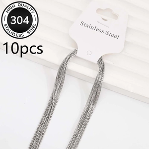Detailed macro view of 10-piece 304 stainless steel hammered circle chain necklaces