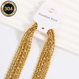 Detail of 304 stainless steel gold bead necklace chains featuring lobster clasps