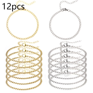 Set of 12 gold and silver curb chain bracelets with lobster clasps and extension links
