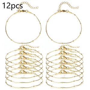 Detail showing 12pcs golden beaded chains with lobster clasp and extension links