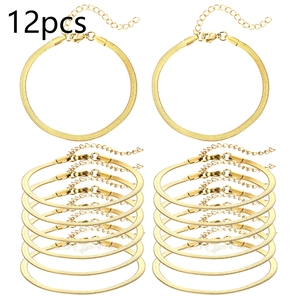 Set van 12 vergulde platte slangenketting armbanden met karabijnsluiting en verlengstuk