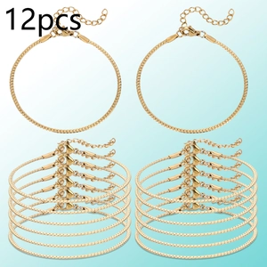 Set of 12 gold-plated snake chain bracelets featuring lobster clasps and extension chains