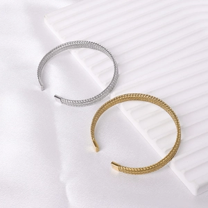 Mesh woven C-shaped cuff bracelets in gold and silver stainless steel finish