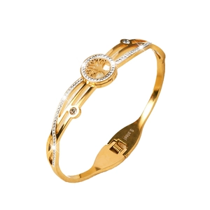 Polished gold Tree of Life stainless steel bracelet with sparkling rhinestone accents
