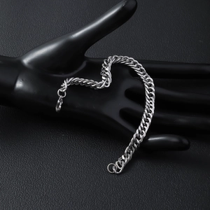 Polished stainless steel double-woven curb chain bracelet for men and women on hand model