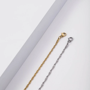 Minimalist twisted spiral chain necklace in gold and silver finish with lobster clasp