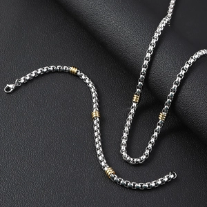 5mm silver box chain necklace with gold decorative rings and lobster clasp