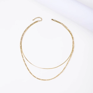 Detail of 18K gold-plated double-layer necklace with snake chain and Figaro link design