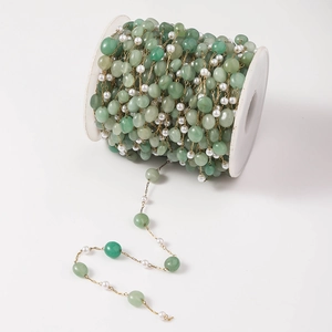 Gold stainless steel DIY chain with green natural stones and small white pearls on a spool
