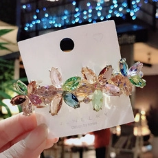 Detail of Korean crystal butterfly hair clip with colorful rhinestones on jewelry card