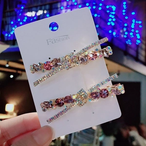 Set de horquillas para el pelo con lazos de diamantes de imitación rosas y morados