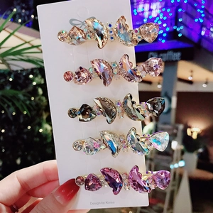 Set of five elegant crystal butterfly hair clips in multiple colors with alloy base