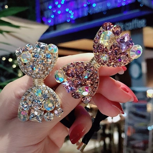 Élastique à cheveux chic en forme de nœud avec strass étincelants en argent et rose