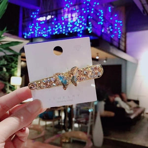 Elegante pinza de pelo de mariposa con brillantes diamantes de imitación coreanos