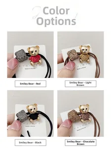 Detailed view of high-elasticity hair ties with crystal cubes and golden bear charms