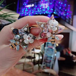 Star-shaped hair tie with baroque pearls, ceramic flowers and sparkling crystals