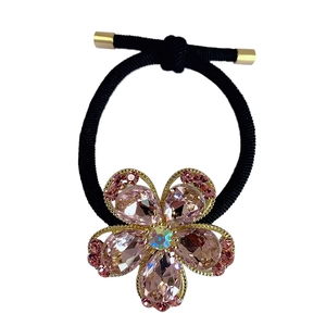 Elegante elastico per capelli con fiore di cristallo rosa e base in metallo dorato decorata