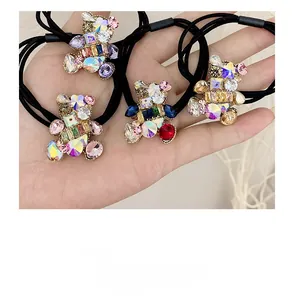 Detail of crystal bear elastic hair ties with colorful rhinestones and gold alloy settings