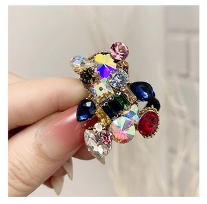 Close-up of bear-shaped hair tie featuring colorful high-sparkle crystal rhinestones