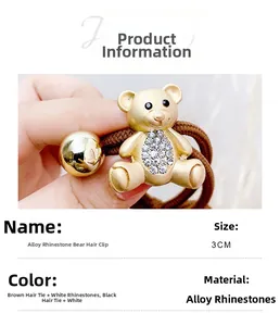 Close-up of golden bear charm with white rhinestones on high-elasticity hair bands