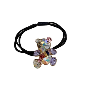 Elastic black hair tie with a colorful crystal bear pendant and sparkling rhinestones