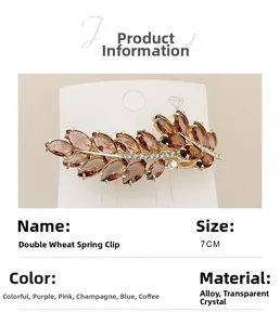 Detail view of golden wheat ear spring hair clip with smoky crystals and dimensions