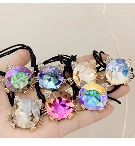 Detailed set of seven cat-shaped crystal hair ties in various vibrant colors