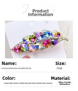 Detailed view of a 7cm gold leaf-shaped hair clip featuring colorful rhinestone crystals