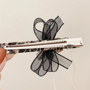 Elegant rhinestone organza hair clip with leopard print fabric and black mesh bow