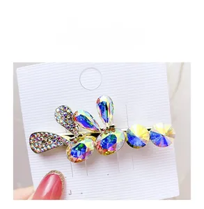 Macro view of crystal rhinestones and alloy base on a stylish Korean hair clip