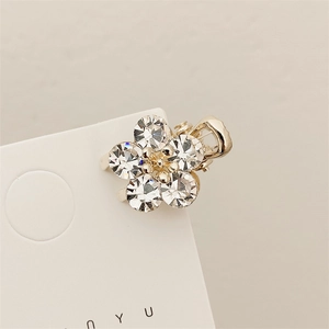 Sparkling crystal flower mini hair claw clip with gold finish for elegant hair styling
