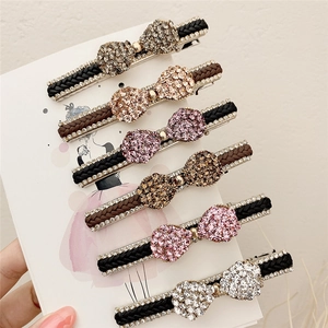 Barrettes à cheveux avec nœud en strass et texture tissée en sept coloris