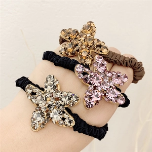 Lot de trois chouchous en strass en forme d'étoile en champagne, rose et gris avec élastique