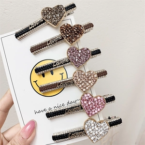 Set of 6 rhinestone heart hair clips with woven strap and Loveme metallic letter charm