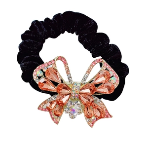 Elegante elastico in velluto nero con fiocco scintillante in cristalli e strass