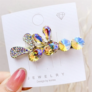Exquisite bee shaped hair clip with colorful crystal rhinestones on a gold metal base