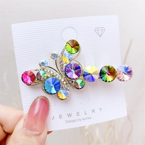 Exquisite gold alloy butterfly hair clip with colorful rhinestones on display card