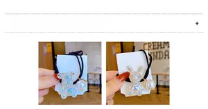 Detailed comparison of pearlescent bear and rabbit charms with large pearls on hair ties