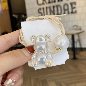 Iridescent bear hair tie with high elastic band and large white faux pearl accessory