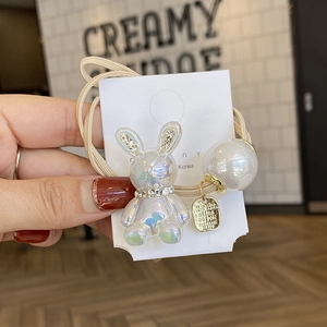 Chameleon rabbit hair tie with pearls and rhinestones on Korea display card