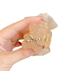 Sparkling champagne gold teddy bear hair claw with rhinestone inlay and organza bow