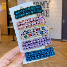 Set of five colorful rhinestone rectangle hair claws with gold-plated metal base
