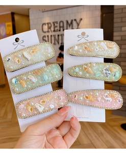 Dettaglio set di 6 fermagli per capelli con perle e conchiglie in stile coreano chic