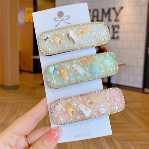 Set di tre fermagli per capelli in stile bohémien con perle, conchiglie e strass
